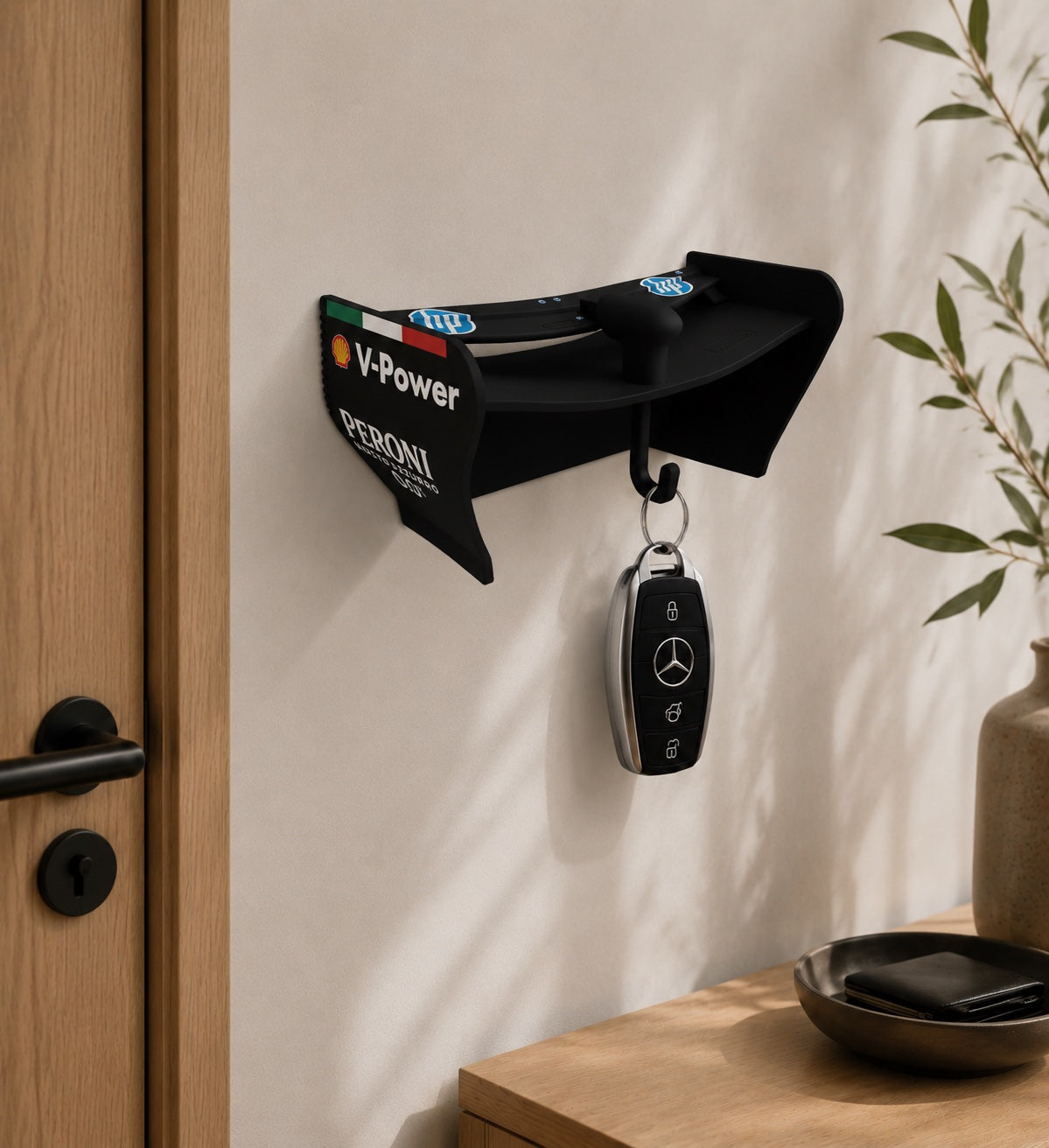 Car keys hanging from the DRS Keyhook with the rear wing open